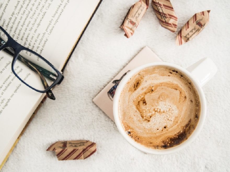 Glasses and a hot coffee