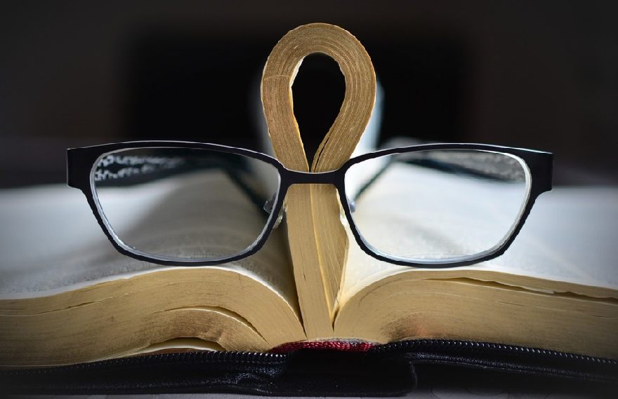 Glasses and book